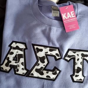 Alpha Sigma Tau lettered sweater cow print glitter